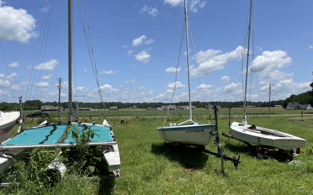 Three boats at auction, Delta Sailing Association.